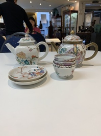 Two Chinese famille rose teapots, four cups and two saucers, Qianlong