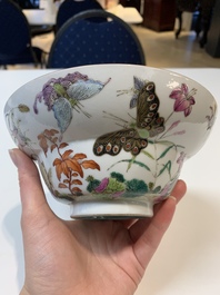 A Chinese famille rose 'butterflies' bowl, a 'boys and kilin' cup and a famille verte 'warriors' bowl, Jiaqiang mark and of the period and 19th C.