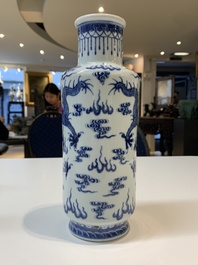 Three Chinese blue and white vases with antiquities, dragons and figures, 19th C.