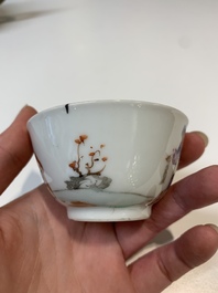 Two Chinese famille rose teapots, four cups and two saucers, Qianlong