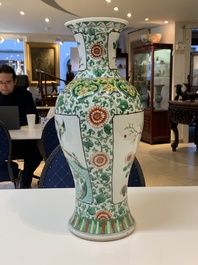Two Chinese famille verte vases and a blue and white celadon-ground vase, 19th C.