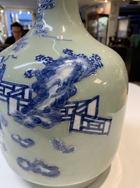 Two Chinese famille verte vases and a blue and white celadon-ground vase, 19th C.