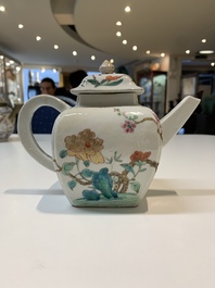 Two Chinese famille rose teapots, four cups and two saucers, Qianlong