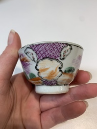 Two Chinese famille rose teapots, four cups and two saucers, Qianlong