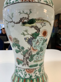 Two Chinese famille verte vases and a blue and white celadon-ground vase, 19th C.
