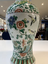 Two Chinese famille verte vases and a blue and white celadon-ground vase, 19th C.