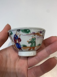 Two Chinese famille rose teapots, four cups and two saucers, Qianlong