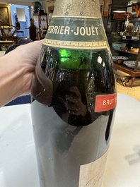 A jeroboam of Perrier-Jou&euml;t champagne from 1947 and a bottle of Veuve Clicquot champagne from 1904