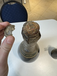 A jeroboam of Perrier-Jou&euml;t champagne from 1947 and a bottle of Veuve Clicquot champagne from 1904