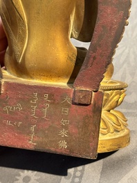 A fine Chinese gilt bronze Buddha, Qianlong mark and of the period