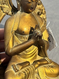 A fine Chinese gilt bronze Buddha, Qianlong mark and of the period