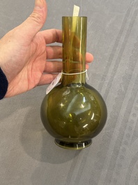 A rare Chinese translucent green Peking glass bottle vase, Qianlong mark and of the period
