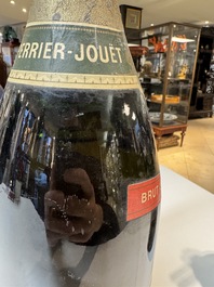 A jeroboam of Perrier-Jou&euml;t champagne from 1947 and a bottle of Veuve Clicquot champagne from 1904
