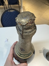 A jeroboam of Perrier-Jou&euml;t champagne from 1947 and a bottle of Veuve Clicquot champagne from 1904
