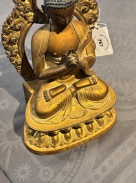 A fine Chinese gilt bronze Buddha, Qianlong mark and of the period