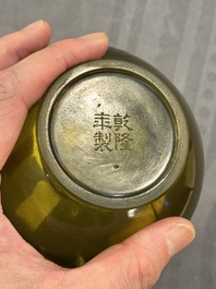 A rare Chinese translucent green Peking glass bottle vase, Qianlong mark and of the period