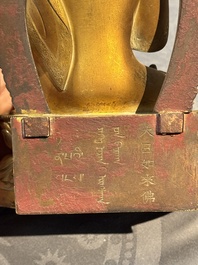 A fine Chinese gilt bronze Buddha, Qianlong mark and of the period