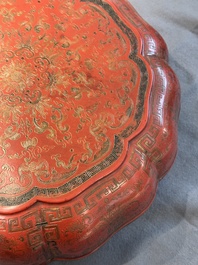 A Chinese red lacquer box and cover with floral design, 19/20th C.