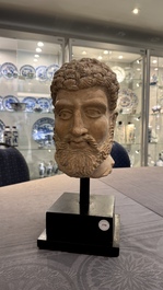 A large terracotta head of a bearded man, Gandhara region, Kushan period, 4/5th C.