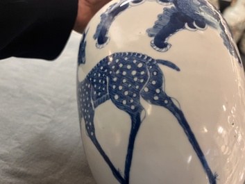 A Chinese blue and white 'mythical animals' vase, Kangxi mark, 19/20th C.