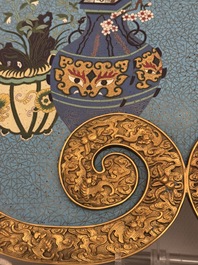 A large Chinese cloisonn&eacute; ruyi-shaped plaque with antiquities, 19/20th C.