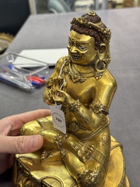 A Sino-Tibetan gilt bronze Virūpa, 19th C.