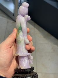 A Chinese lavender- and mint-green-jade figure of a goddess holding a sceptre and fan on wooden stand, 19th C.
