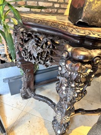 A finely carved Chinese hongmu console table with marble top and mother-of-pearl inlay, Canton, 19th C.