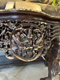 A finely carved Chinese hongmu console table with marble top and mother-of-pearl inlay, Canton, 19th C.