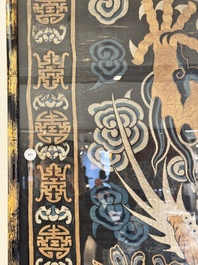 A Chinese embroidered silk tapestry with a five-clawed dragon among clouds and bajixiang, 18/19th C.