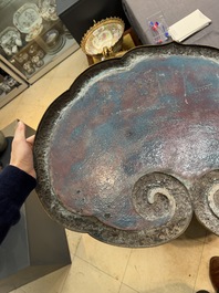 A large Chinese cloisonn&eacute; ruyi-shaped plaque with antiquities, 19/20th C.