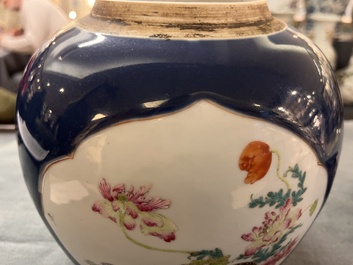 A fine Chinese blue-ground famille rose 'quails and peonies' jar and wooden cover, Qianlong