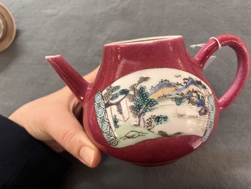 A Chinese famille rose ruby-ground 'landscape scroll' teapot, Yongzheng