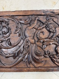 A carved walnut panel depicting the victory of good over evil, 16th C.