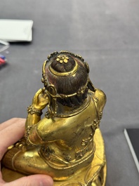 A Sino-Tibetan gilt bronze Virūpa, 19th C.