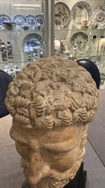 A large terracotta head of a bearded man, Gandhara region, Kushan period, 4/5th C.
