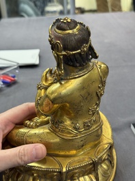 A Sino-Tibetan gilt bronze Virūpa, 19th C.