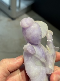 A Chinese lavender- and mint-green-jade figure of a goddess holding a sceptre and fan on wooden stand, 19th C.