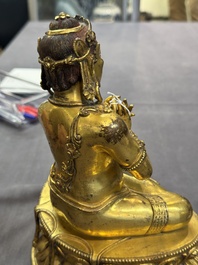 A Sino-Tibetan gilt bronze Virūpa, 19th C.