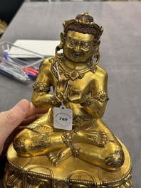 A Sino-Tibetan gilt bronze Virūpa, 19th C.