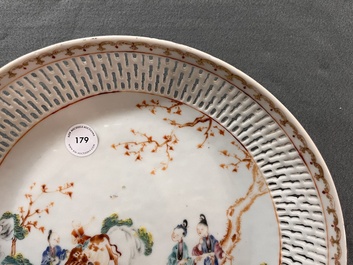 A Chinese famille rose 'mandarin subject' dish with a reticulated border, Qianlong