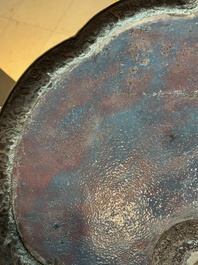 A large Chinese cloisonn&eacute; ruyi-shaped plaque with antiquities, 19/20th C.