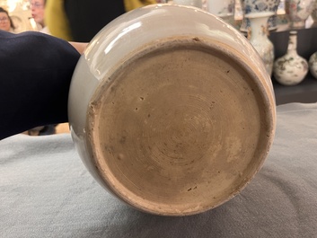 A Chinese famille rose 'Qi Lin Song Zi 麒麟送子' jar and wooden cover, Qianlong/Jiaqing