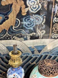 A Chinese embroidered silk tapestry with a five-clawed dragon among clouds and bajixiang, 18/19th C.