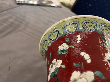 A pair of Chinese famille rose ruby-ground 'landscape' vases, 19th C.