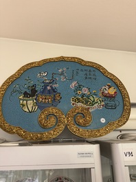 A large Chinese cloisonn&eacute; ruyi-shaped plaque with antiquities, 19/20th C.