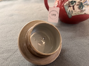 A Chinese famille rose ruby-ground 'landscape scroll' teapot, Yongzheng