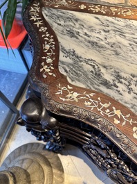 A finely carved Chinese hongmu console table with marble top and mother-of-pearl inlay, Canton, 19th C.