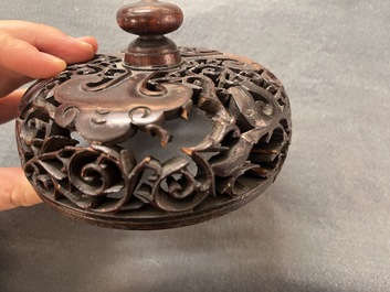 A Chinese famille rose 'Qi Lin Song Zi 麒麟送子' jar and wooden cover, Qianlong/Jiaqing