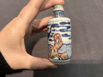 A Chinese blue, white and copper-red 'Journey to the West' snuff bottle, Yongzheng mark, 19th C.